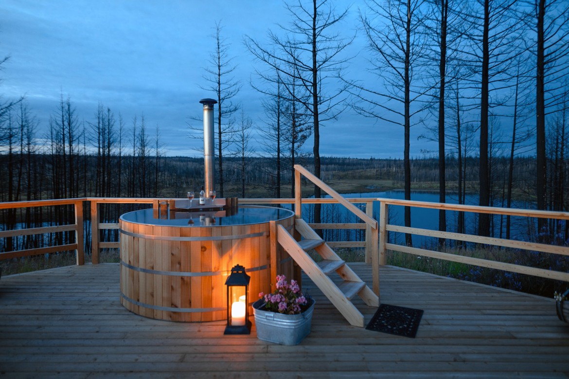 When staying in Star Camp, soak in a wood-fired cedar soaker hot tub