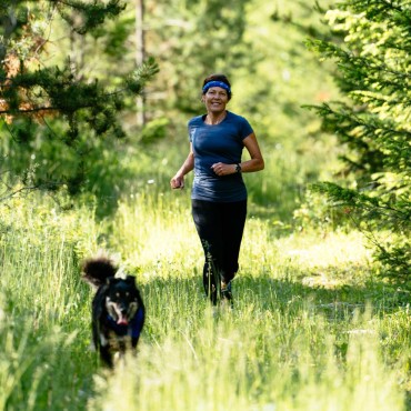 A jog through the forest with a trusty ranch dog alongside